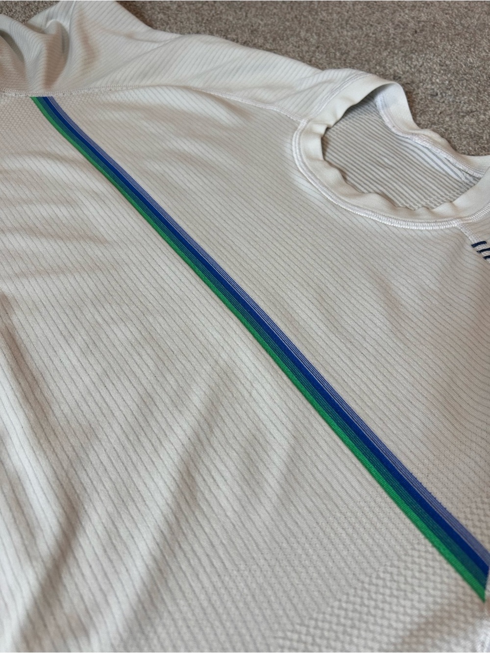 Unique Lulu Lemon White Athletic Top with Blue and Green Stripe